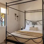 Bozonos - Beachfront Simplicity With Heated Pool Ammoudi